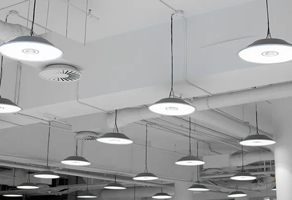 Modern commercial fixtures with stylish pendant lights in a well-lit space, highlighting fixture upgrades in La Quinta, CA.
